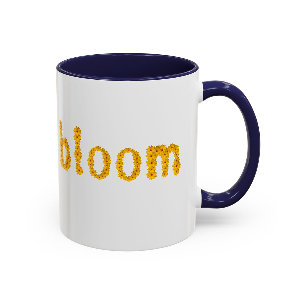 "bloom" floral text Coffee Mug | sunflower petal typography, white & black accent