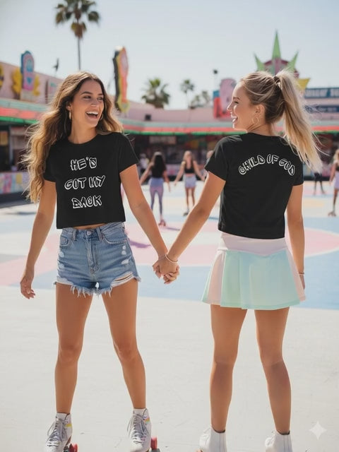 Child of God Women's Baby Tee — He's Got My Back Religious Graphic Top